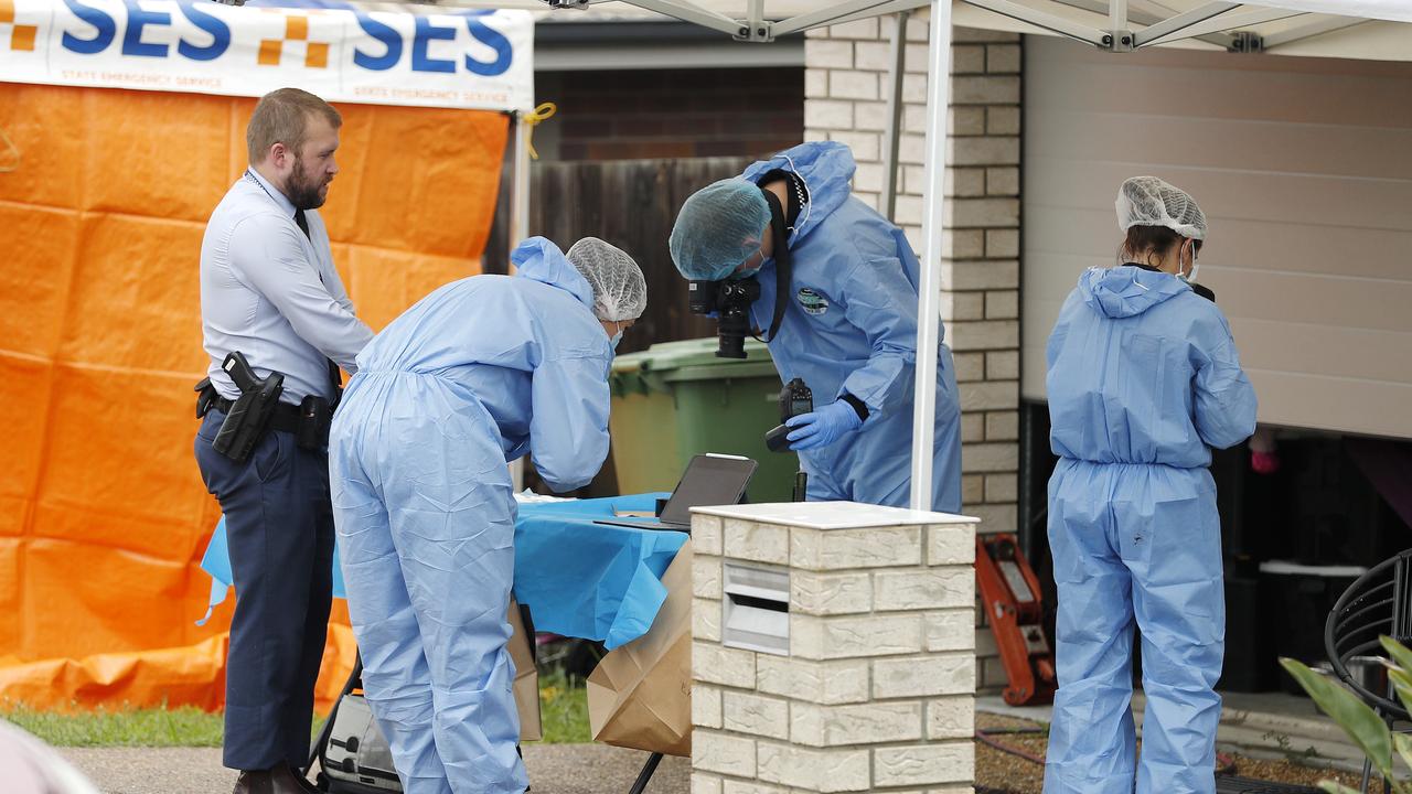 Police and emergency services pictured at a home in Lowood after a man was found dead Tuesday morning. PICUTRE: Josh Woning