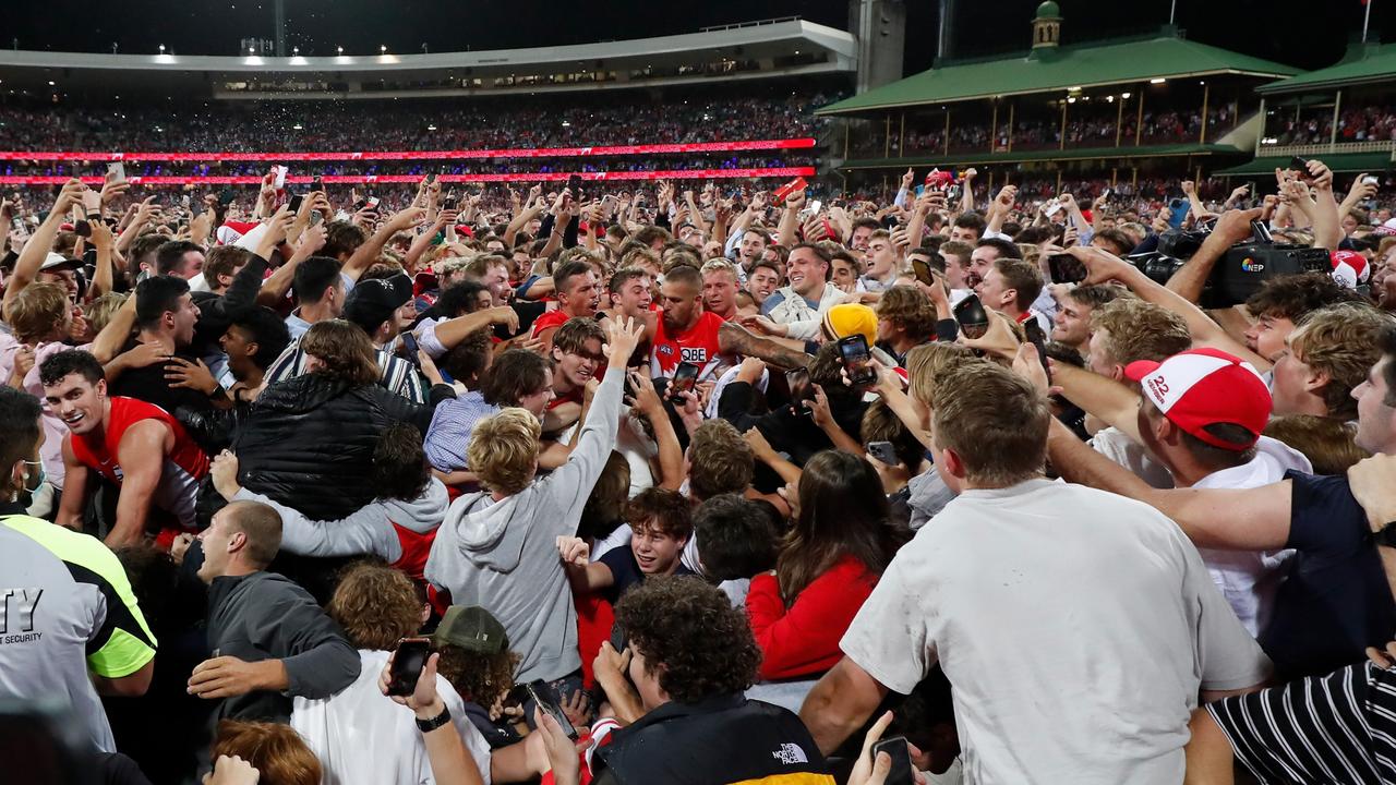 Buddy was mobbed. (Photo by Michael Willson/AFL Photos via Getty Images)