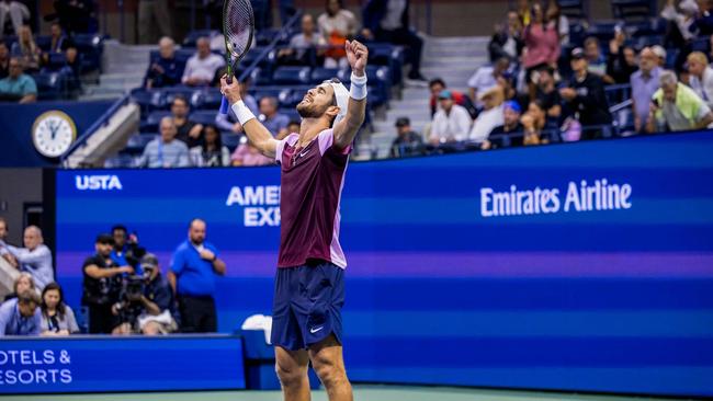 Russia's Karen Khachanov celebrates after defeating Australia's Nick Kyrgios in the 2022 US Open Tennis tournament men's singles quarter-finals at the USTA Billie Jean King National Tennis Center in New York on September 6, 2022. (Photo by COREY SIPKIN / AFP)