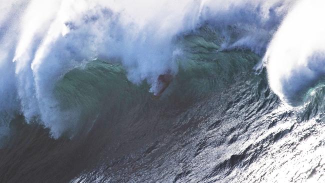 Legendary Brazilian waterman Kalani Lattanzi dropped from the sky. Photograph: Dallas Kilponen.