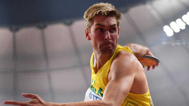 Australia's Cedric Dubler competes in the discus. (Photo by ANDREJ ISAKOVIC / AFP)