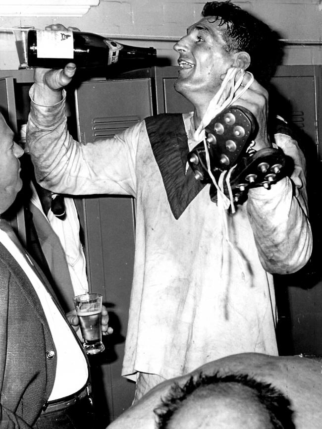 St George captain and coach Norm Provan celebrates after leading his team to its 10th straight grand final win in 1965. Picture: Supplied