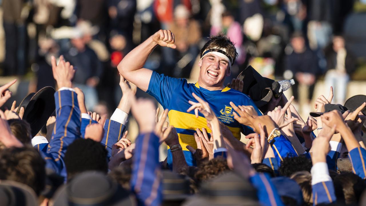 TGS First XV captain Charlie Horn is lifted by the student body in celebration after defeating Downlands to claim the O'Callaghan Cup on Grammar Downlands Day at Downlands College, Saturday, August 6, 2022. Picture: Kevin Farmer