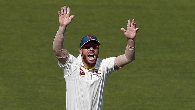 David Warner in the unfamiliar role of slip during the All-Australian clash in Southampton on Tuesday. Picture: Getty Images