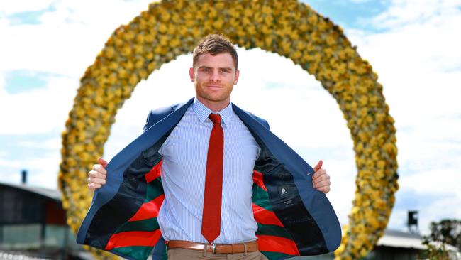 GWS Giants player Heath Shaw with the custom made jacket inspired by The Autumn Sun’s racing silks. Picture: Angelo Velardo