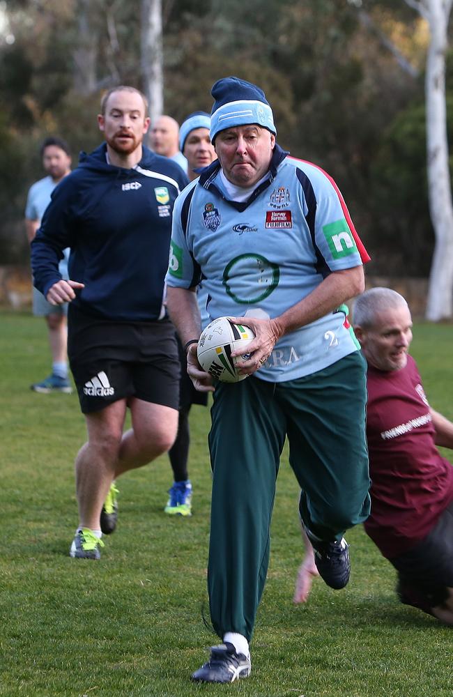 Anthony Albanese running with the footy in the Parlimentary NRL State of Origin touch football match at Parliament House in Canberra. Picture: Kym Smith