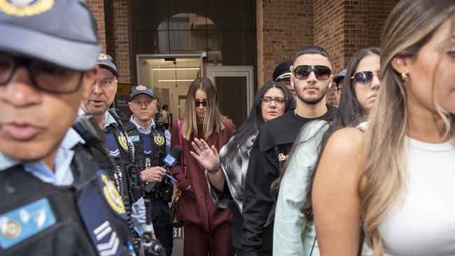 She was escorted out of court by police alongside supporters. Picture: NCA NewsWire/Simon Bullard