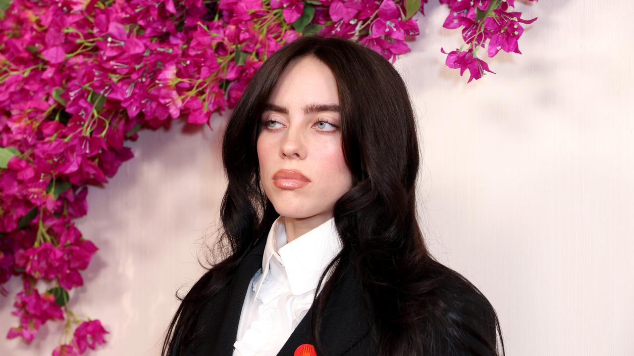 Billie Eilish and her manager have fuelled rumours of a feud with Taylor Swift this week with a series of comments and posts. Photo: JC Olivera/Getty Images.