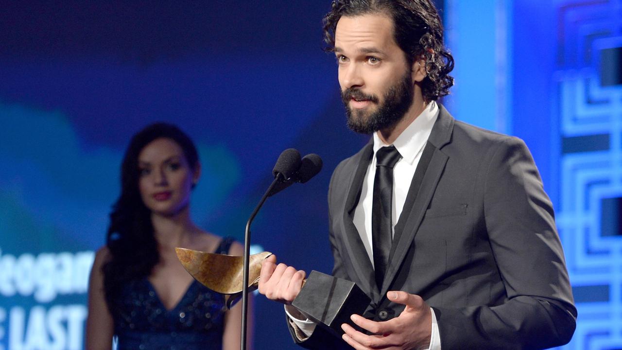 Mazin’s fellow showrunner Neil Druckmann accepting an award for Outstanding Achievement in Video Game Writing back in 2014. Picture: Alberto Rodriquez/Getty Images