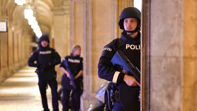 Armed police patrol near the opera in central Vienna. Picture: Joe Klamar/AFP