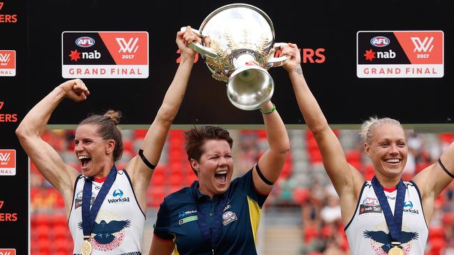 Chelsea Randall, Bec Goddard and Erin Phillips celebrate the inaugural AFLW premiership. Picture: Michael Willson/Getty Images