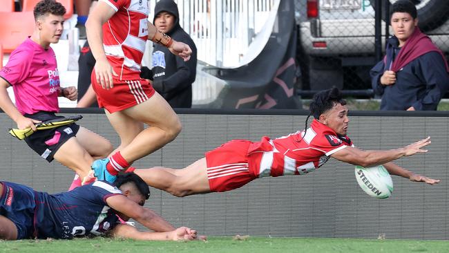 PBC SHS’s Creedence Donovan scores a try - he’s a Red Alert player. Picture: Liam Kidston.