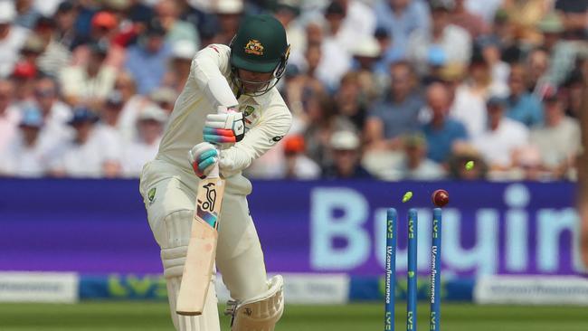 Australia's wicket keeper Alex Carey is bowled by England's James Anderson. Picture: AFP