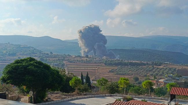 Smoke from a pre-emptive Israeli air strike on Zibqin, southern Lebanon, on Sunday as hostilities escalated across the weekend between Israel and Hezbollah. Picture: AFP