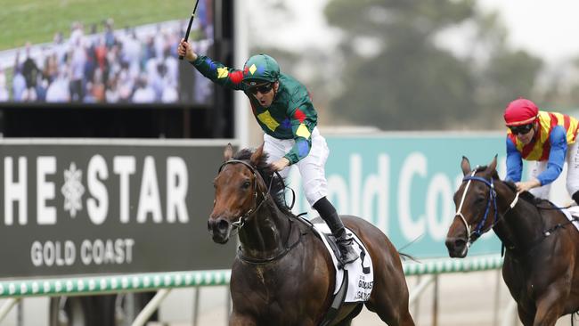 Ryan Maloney salutes the crowd after winning the Magic Millions Guineas with Alligator Blood. Picture: Getty Images