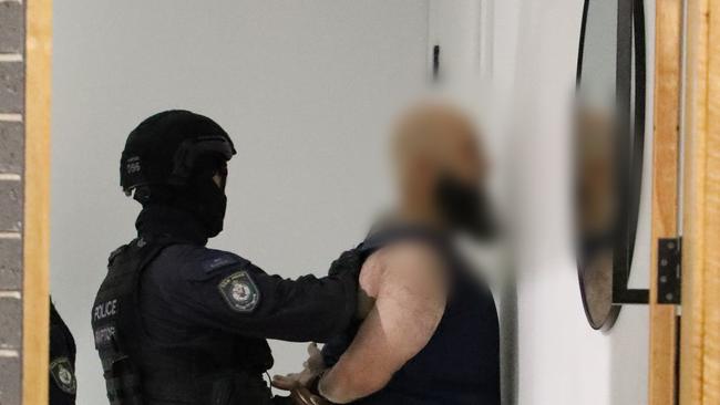 At the Georges Hall address, detectives arrested a 37-year-old man. In Yagoona, they arrested a 38-year-old man Picture: NSW Police