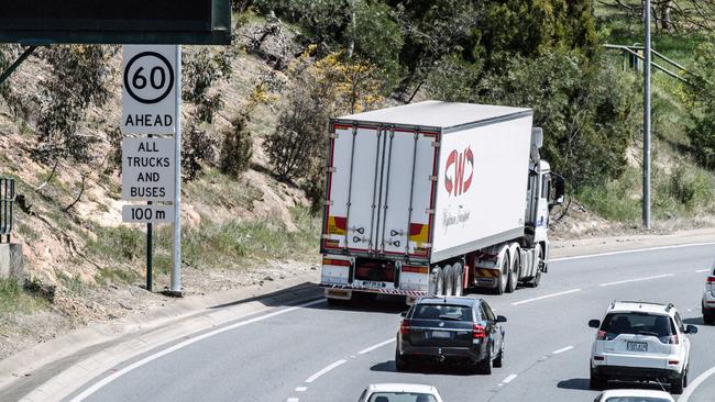 A truck heads down the South-Eastern Freeway towards the city. Picture: AAP / Morgan Sette