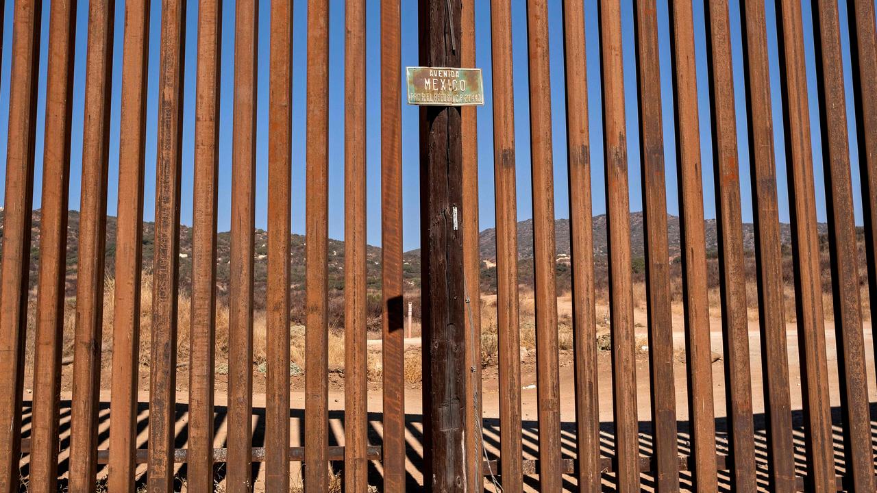 View of a recently reinforced section of the US-Mexico border as seen from Tecate, Baja California State, Mexico, on October 7, 2020. Picture: Guillermo Arias / AFP