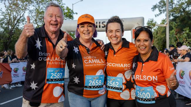 Brian O'Gallagher, Minister Robyn Cahill, Chief Minister Lia Finocchiaro and Oly Carlson crossing the finish line at the 2025 edition of the annual NT City2Surf, Sunday, June 1. Picture: Pema Tamang Pakhrin