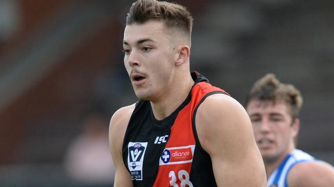 Sam Draper has re-signed with Essendon after attracting interest from St Kilda.