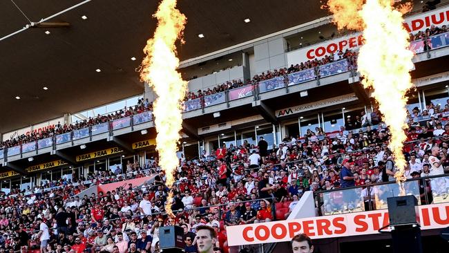 ADELAIDE, AUSTRALIA - JANUARY 18: Referees lead the teams out  during the round 15 A-League Men match between Adelaide United and Melbourne Victory at Coopers Stadium, on January 18, 2025, in Adelaide, Australia. (Photo by Mark Brake/Getty Images)