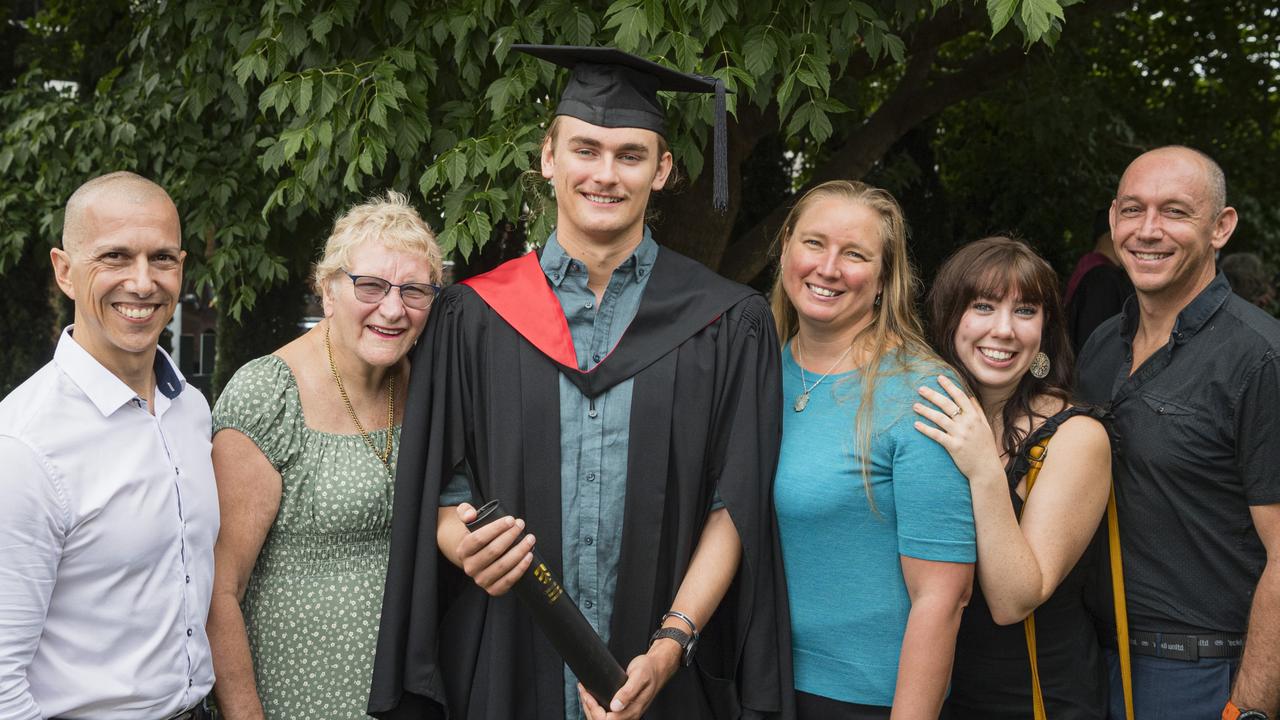 Bachelor of Information Technology graduate Byron Mammana with (from left) Michael Mammana, Julie Wahren, Lisa Mammana, Katie Gear and Andrew Westwick at a UniSQ graduation ceremony at Empire Theatres, Tuesday, February 13, 2024. Picture: Kevin Farmer