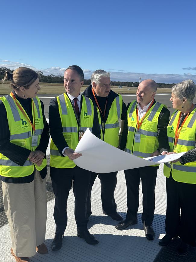 Federal Member for Franklin Julie Collins, Hobart Airport chief executive Norris Carter, Federal Member for Lyons Brian Mitchell MP, Downer chief executive Stuart Billing, and Tasmanian Senator Catryna Bilyk