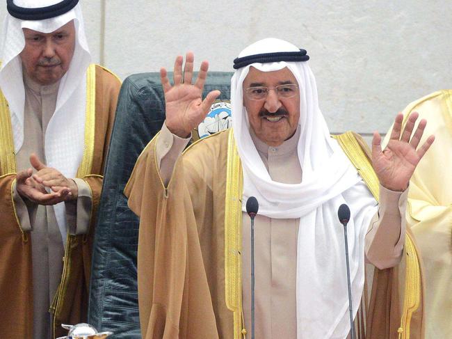 Emir of Kuwait Sheikh Sabah al-Ahmad al-Sabah (C), Kuwaiti crown prince Sheikh Nawaf al-Ahmad al-Sabah (R) and Kuwaiti parliament speaker Marzouq al-Ghanim attend the opening session of the new parliamentary term in Kuwait City on October 28, 2014. Kuwait's ruler warned that declines in the oil price were damaging the economy of the energy-rich Gulf state, urging lawmakers to 