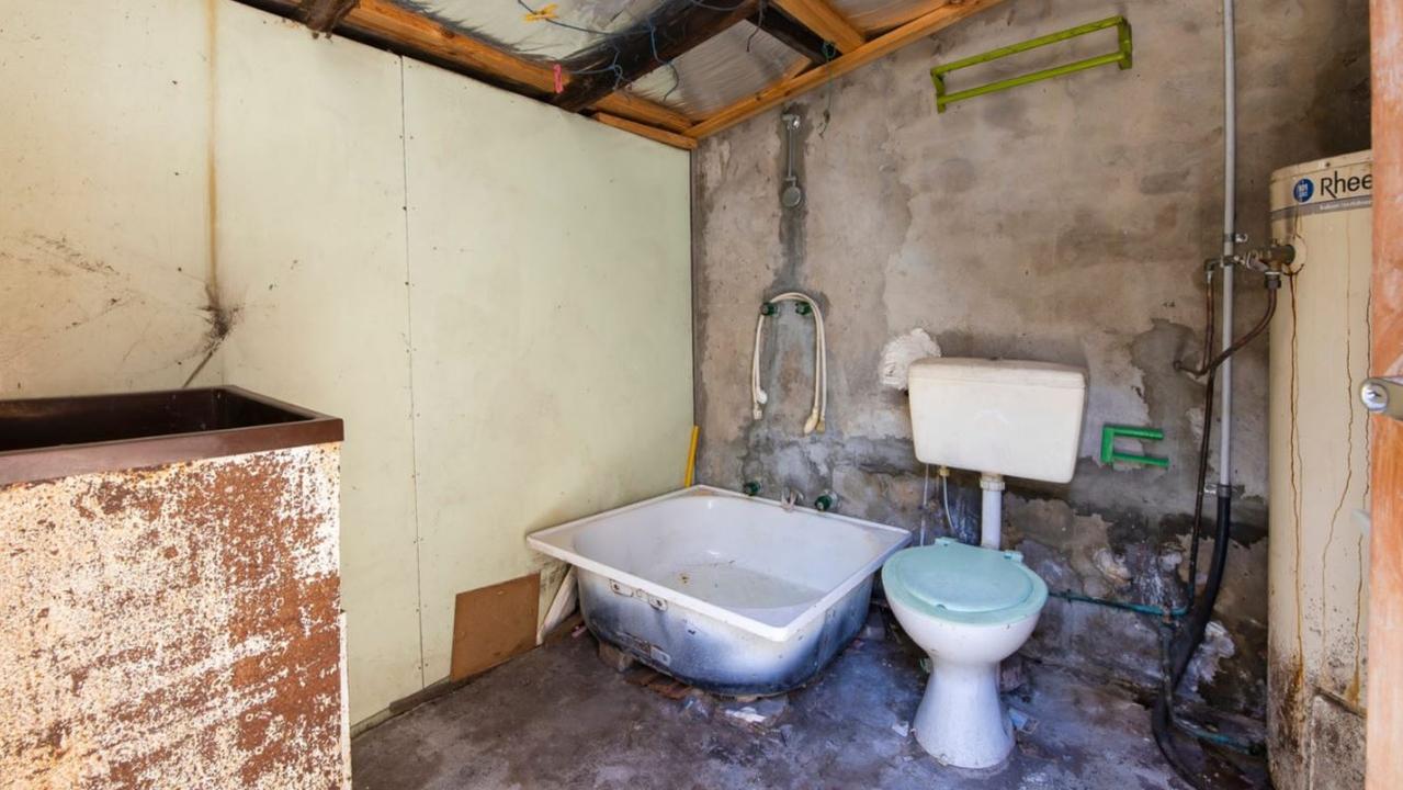 A view of the separate bathroom on the property.