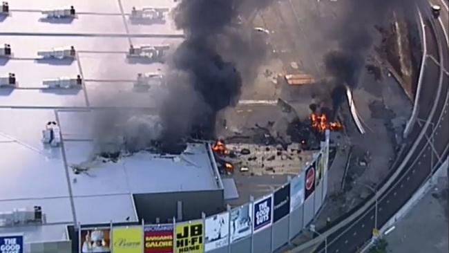 The scene soon after the plane crash at Essendon DFO. Picture: 9 News