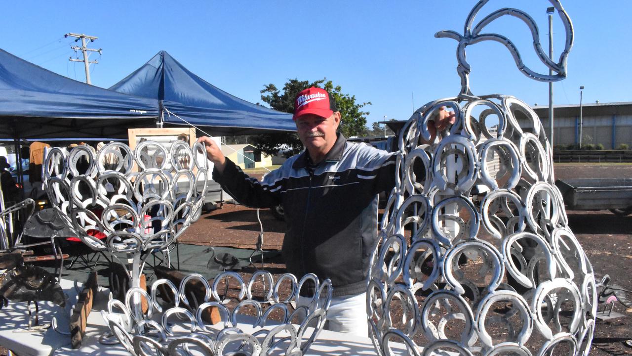 SWAP MEET: Tony Gosland from Craignish displays his recycled horseshoe sculptures available at the Maryborough swap meet. Photo: Stuart Fast