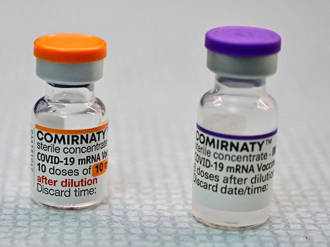 A vial of the BioNTech and Pfizer vaccine in the paediatric dosage, left, next to a vial in the adult dosage. Picture: AFP