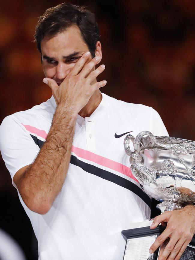 An emotional Roger Federer with his trophy. Picture: Michael Klein