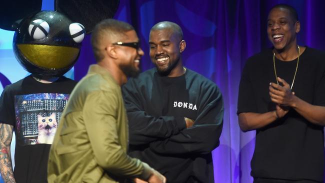 Making waves ... Deadmau5, Usher, Kanye West, and Jay-Z onstage at the Tidal relaunch event in New York on March 30. Picture: Jamie McCarthy/Getty Images