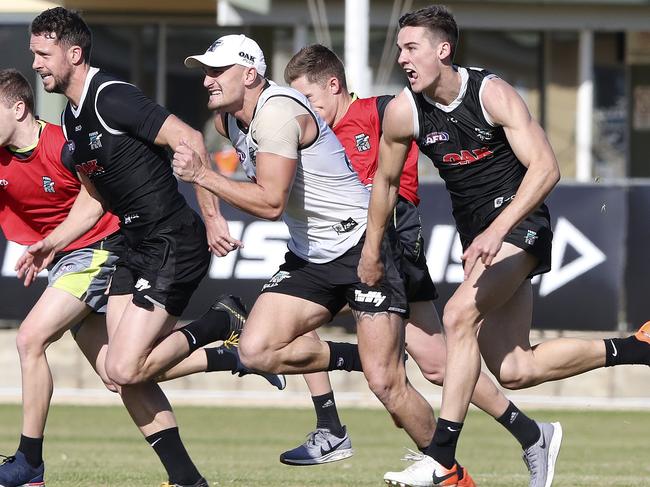 At Port’s training session, Travis Boak, Sam Powell-Pepper and Connor Rozee were put through their paces. Boak and Rozee are two of only six players who have played every game so far this AFL season. Picture: SARAH REED