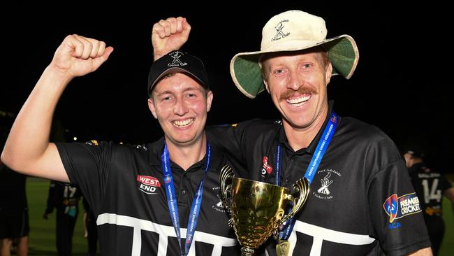 Port Adelaide captain Austin Umpherston and Nick Benton (right) with the SACAPremier Cricket T20 trophy in 2022. Picture: Simon Stanbury