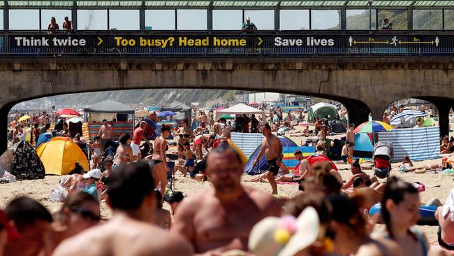 The scene on Boscombe Beach, Bournemouth, in the south of England on Saturday. Picture: AFP