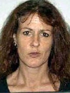 Julie Louise McColl naked body was found at Trichi Tamba Wetlands Reserve at Deep Water Bend, Bald Hills on 26 Feb 2003.