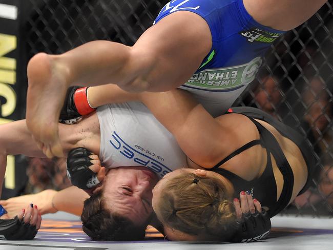 Some men would welcome the opportunity to tangle with Rousey on the mat.