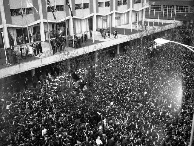 The Southern Cross Hotel, with Exhibition Street jam-packed with Beatles fans. Picture: HWT Library