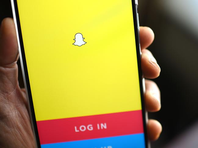 (FILES) In this file photo taken on March 1, 2017 the Snapchat log-in page is displayed on a mobile phone in Glendale, California. - The youth-focused social network Snapchat announced October 10, 2018 it was launching a new slate of original video shows under its own brand in the latest move to spark growth. The shows unveiled under the Snap Originals brand include a new comedy, a mystery thriller and a 