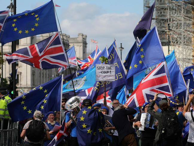 Anti-Brexit activists, and demonstrators opposing the British government's actions in relation to the handling of Brexit, protest outside the Houses of Parliament. Picture: AFP