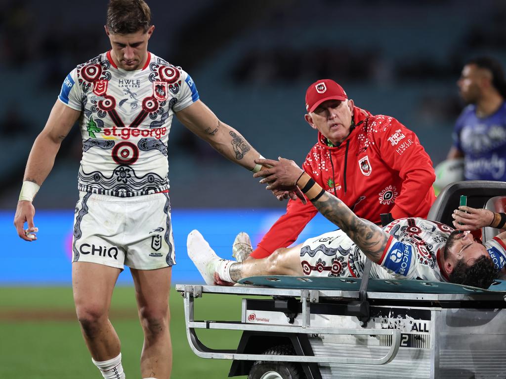 SYDNEY, AUSTRALIA - MAY 23: Zac Lomax of the Dragons checks up on Jack Bird of the Dragons as he is stretchered off the field after an injury during the round 12 NRL match between Canterbury Bulldogs and St George Illawarra Dragons at Accor Stadium on May 23, 2024, in Sydney, Australia. (Photo by Cameron Spencer/Getty Images)