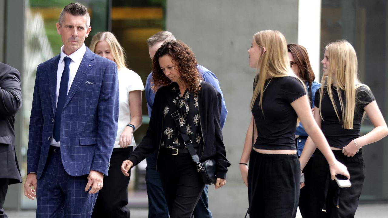 Lee Lovell leavers the Supreme Court with daughters and family members after a pre sentence hearing. Photo: Steve Pohlner.