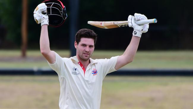 Footscray’s Ash Armstrong celebrates his century on Saturday. Picture: Stephen Harman