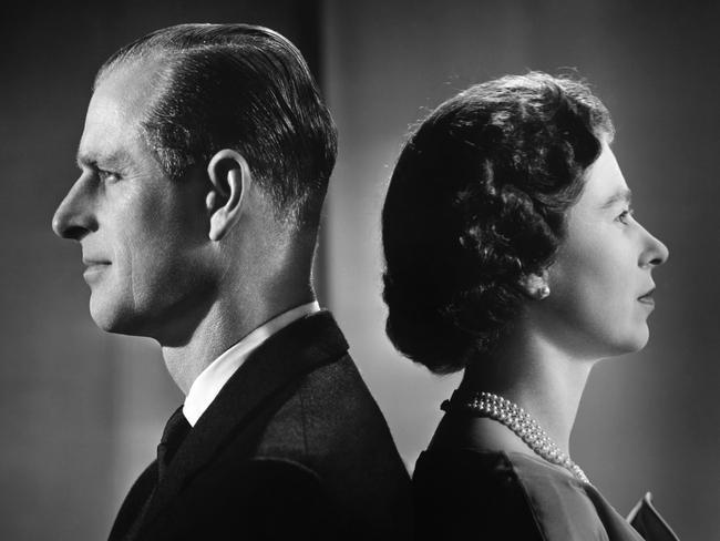 Prince Philip and Queen Elizabeth II posing for a portrait at home in Buckingham Palace in December 1958. Picture: Getty