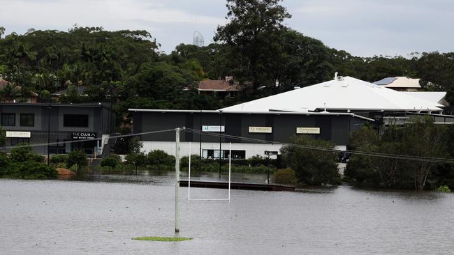 Wet weather – the Gold Coast Titans training ground underwater in Parkwood. Picture: Nigel Hallett