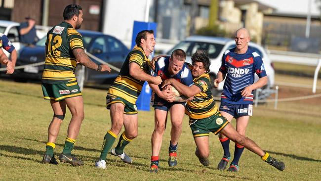 BATTLING THROUGH: Jarred Bradfield on the attack for Warwick against Wattles at Platz Oval. Picture: Gerard Walsh