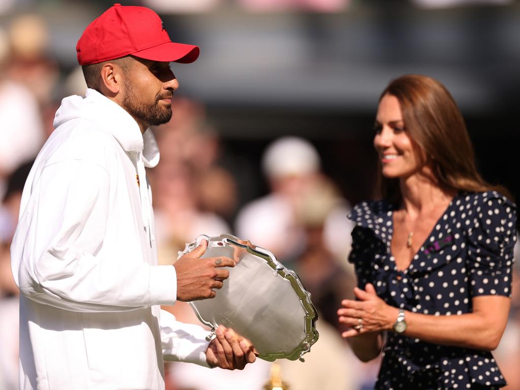 Nick Kyrgios of Australia receives the runner up trophy from Catherine, Duchess of Cambridge following his defeat to Novak Djokovic of Serbia. Picture: Ryan Pierse/Getty Images