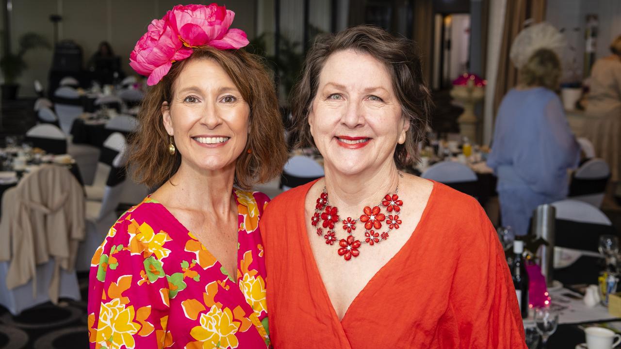 Paula Tregaskis (left) and Jill Scanlan at the Melbourne Cup luncheon hosted by Rotary Club of Toowoomba City raising funds for Protea Place, Tuesday, November 1, 2022. Picture: Kevin Farmer